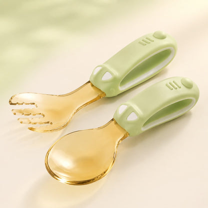 Toddler eating training fork and spoon set